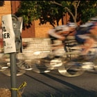 bike race in front of parking meter